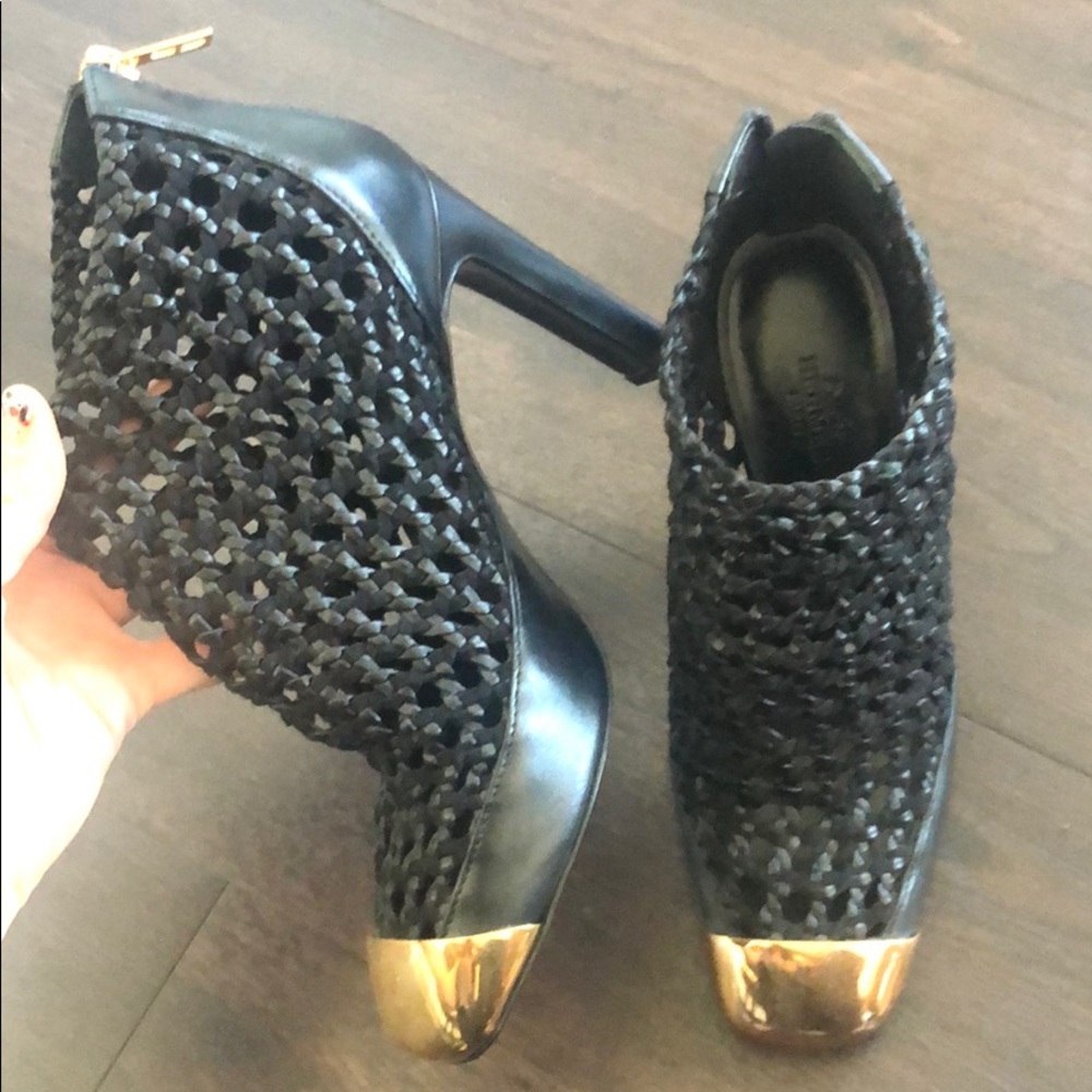 Hermès woven black leather and gold toe cap boots